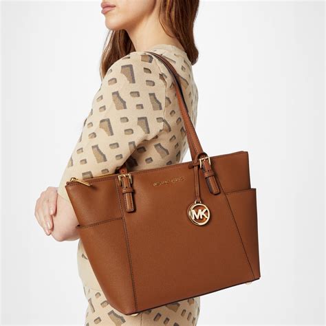 jet set tote bag michael kors|Michael Kors jet set duffle.